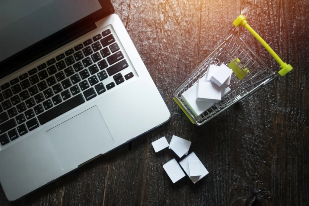 A laptop showing an abandoned online shopping cart on a Shopify store