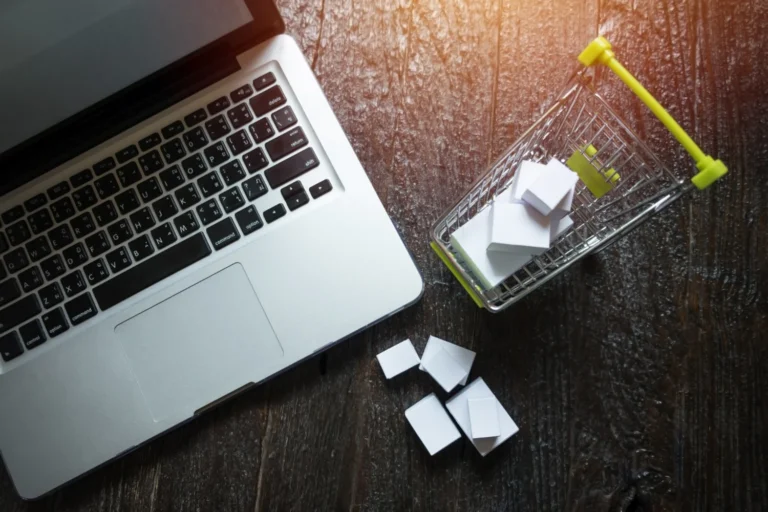 A laptop showing an abandoned online shopping cart on a Shopify store